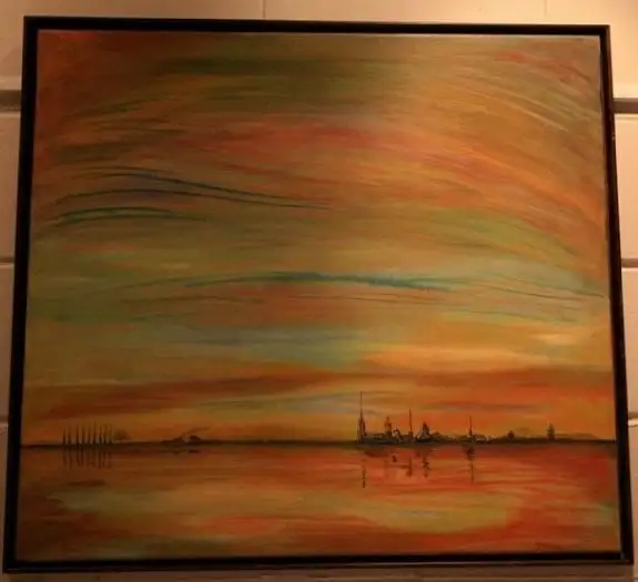 A wide calm harbour at dusk under horizontal bands of amber, green and grey, with a low skyline of domes and spires on the right, a dark stand of trees on the left, and a mirror-still reflection below