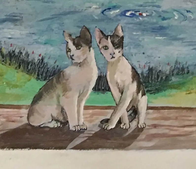 Two young cats, one grey and white and one tabby and white, sit side by side on a warm wooden deck with a green bank of red-tipped reeds and a blue lake behind them, in soft watercolour on paper