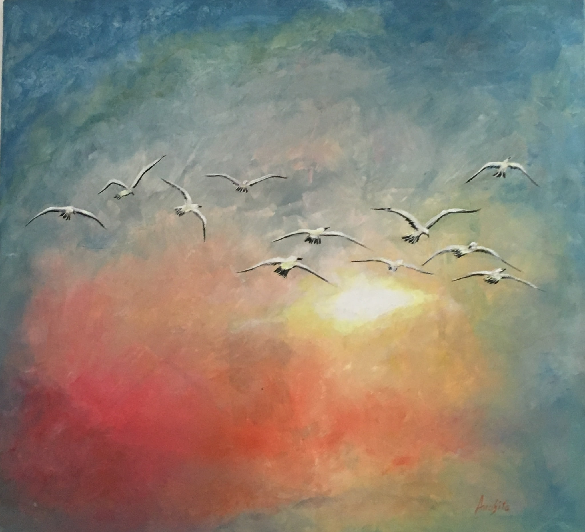 A flock of eleven white seabirds with dark wingtips crossing a broad glowing sky of coral, gold and blue, a soft white sun at the lower centre