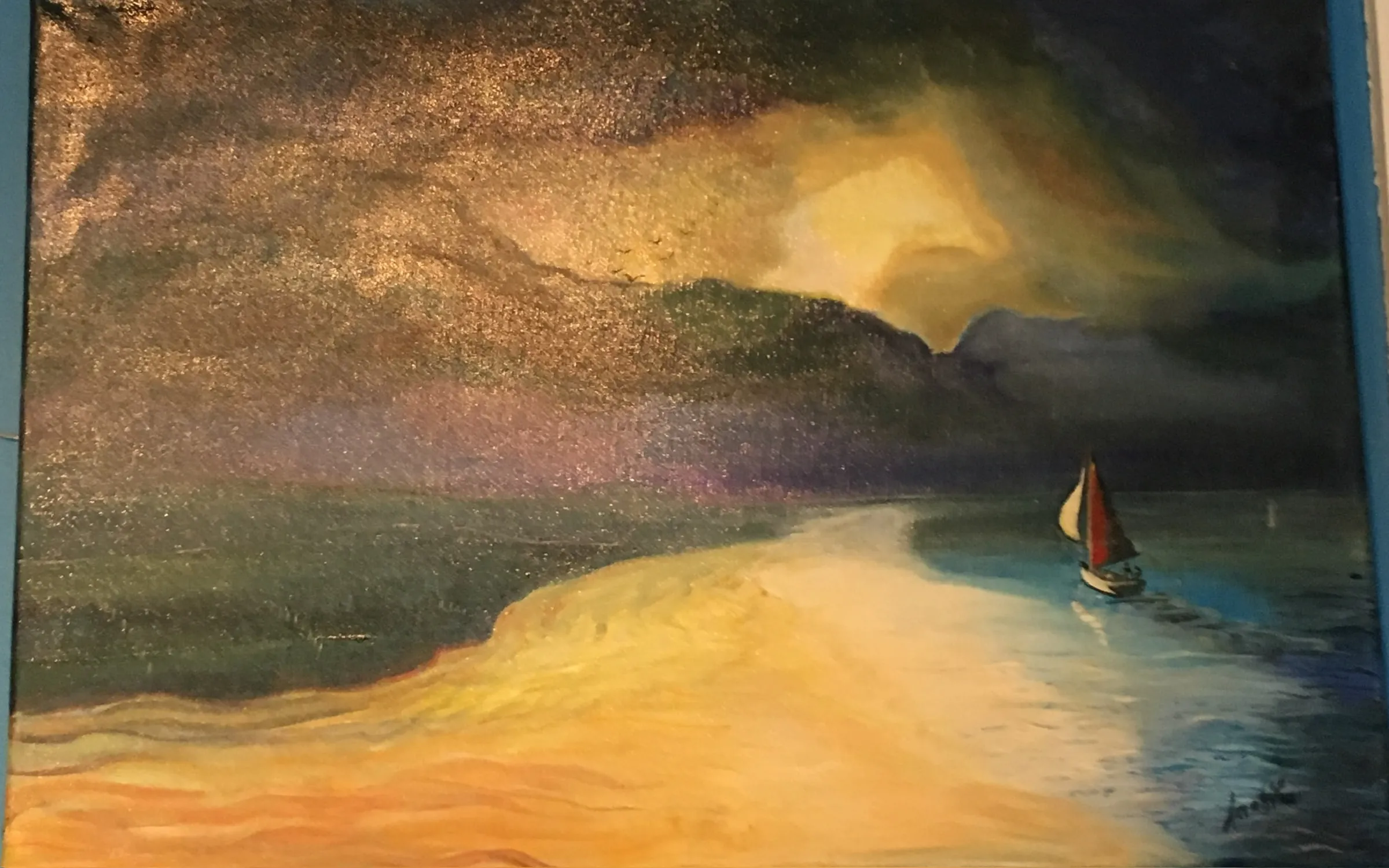 A dusk seascape with a small sailing boat under a red and white sail crossing dark water beside a wide golden sandbank, under a stormy sky of gold, plum and near-black cloud