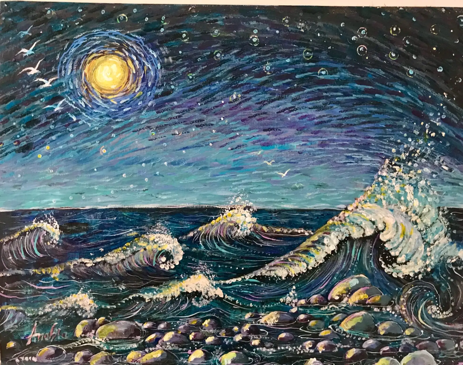 A moonlit sea with a golden moon ringed in blue-violet strokes, three white gulls, rolling teal and cobalt waves breaking, and multicoloured wet pebbles along the shore
